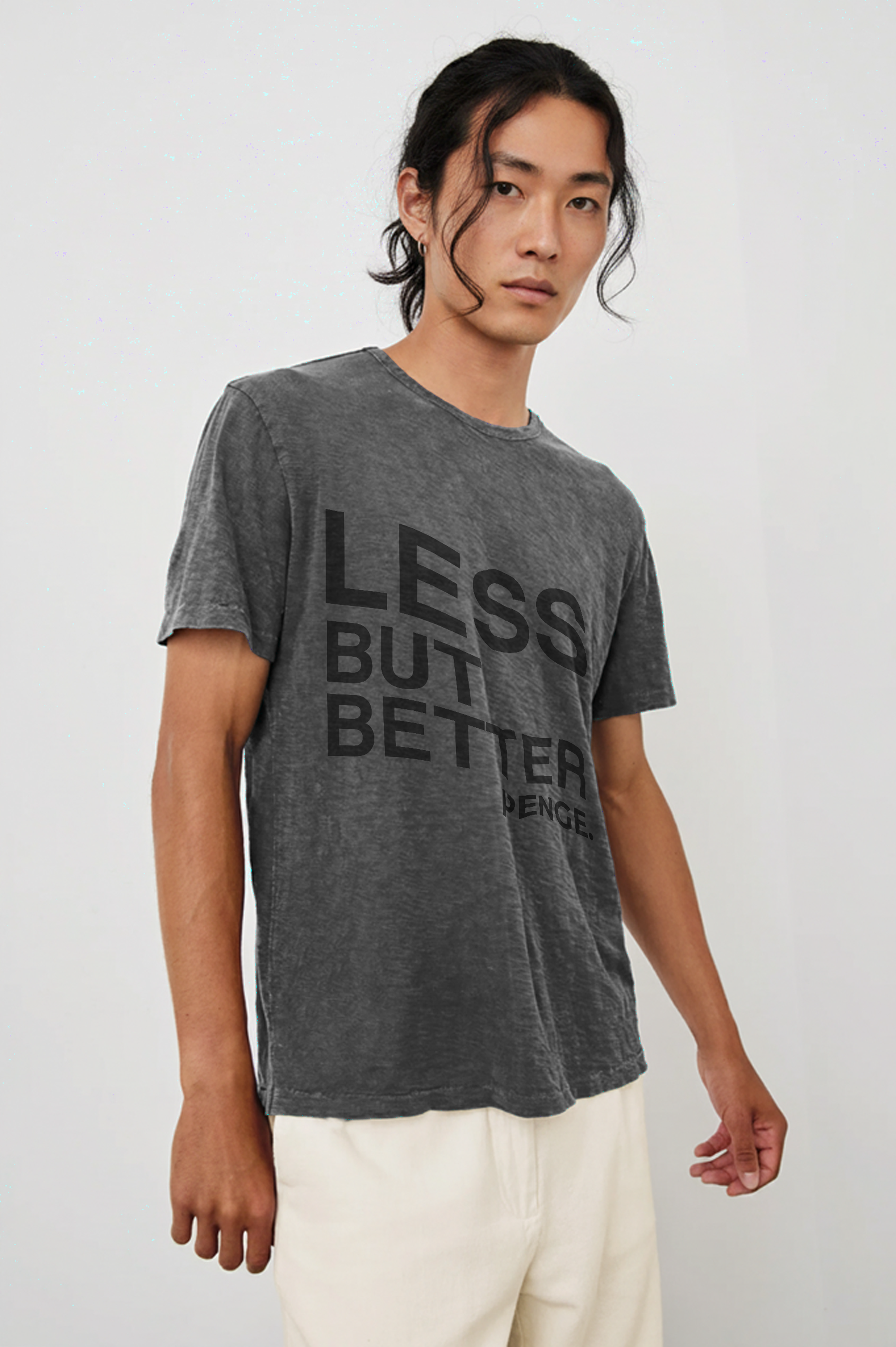 Men Model wearing LESS BUT BETTER Tee.